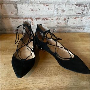 Black laced suede flats